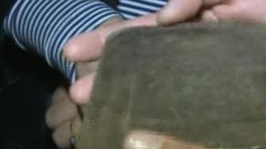 Адам терісінен жасалған әмиян Ақтау мұражайында тұр